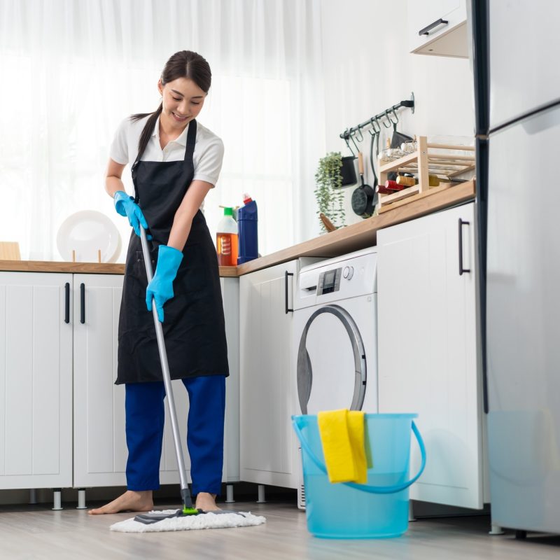 asian-active-cleaning-service-woman-worker-cleaning-in-kitchen-at-home-